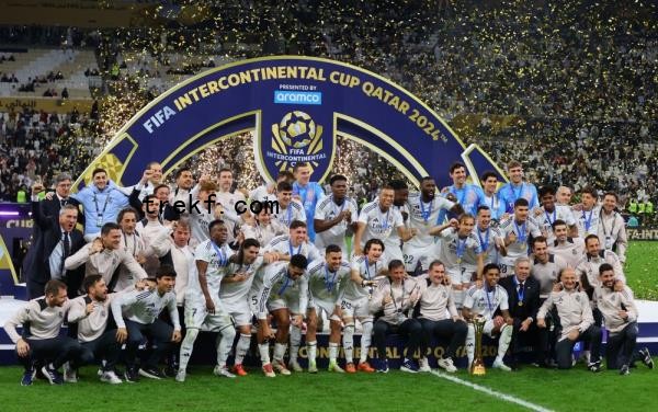 Real Madrid players celebrate during the trophy lift after winning the Interco<em></em>ntinental Cup. — Reuters