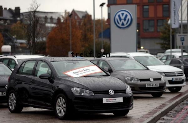 Volkswagen cars are parked outside a VW dealership in London. — Reuters