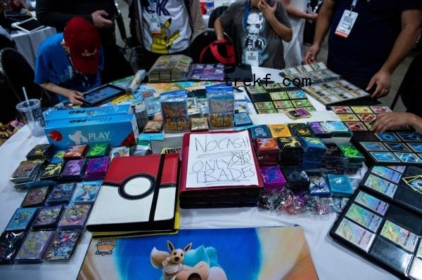 People trade Pokemon cards during the first day of the 2019 Pokemon World Champio<em></em>nships at the Washington Co<em></em>nvention Center in this file picture dated August 16, 2019, in Washington, DC. With more than 60 million downloads and nearly US$180 million generated worldwide since the end of October 2024, the mobile game adaptation of Pokemon cards has enjoyed global success, not far from the records of its predecessor. — AFP pic