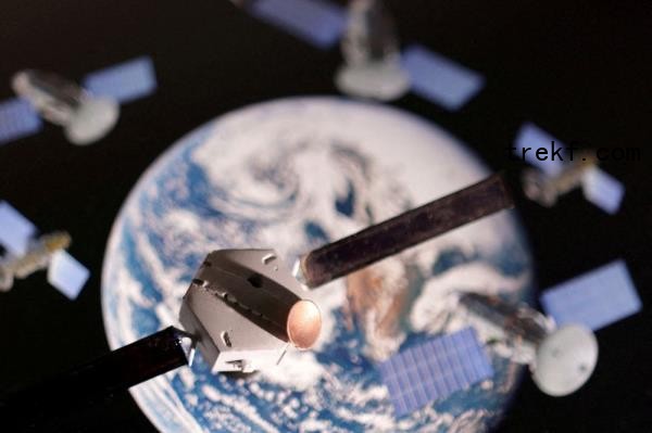 A satellite model is placed on a picture of Earth in this illustration taken November 25, 2024. — Reuters pic
