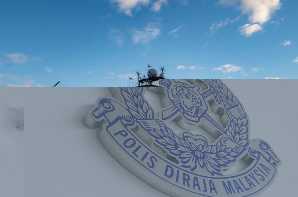 Police today arrested five men believed to be involved in a brawl outside a building on Jalan Yap Kwan Seng two days ago, which resulted in three victims sustaining injuries from knife slashes. — Picture by Choo Choy May.