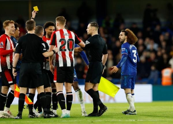 Chelsea<em></em>'s Marc Cucurella is shown a second yellow card by referee Peter Bankes before being sent off. — Reuters pic