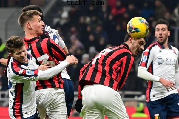 AC Milan<em></em>'s Spanish forward Alvaro Morata (second right) heads the ball during the Italian Serie A football match between AC Milan and Genoa at the San Siro Stadium in Milan, on December 15, 2024. — AFP pic