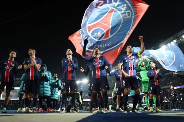 Paris Saint-Germain players celebrate their victory in front of their supporters at the end of the French L1 football match between with Olympique Lyo<em></em>nnais at the Parc des Princes stadium in Paris on December 15, 2024. — AFP pic