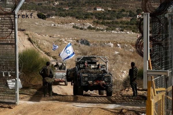 Israeli military vehicles cross the fence as they return from the buffer zone with Syria, near the Druze village of Majdal Shams in the Israel-annexed Golan Heights on December 10, 2024. — AFP pic