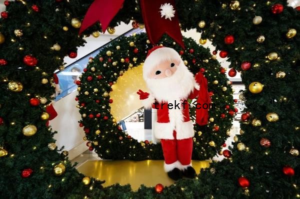 A person dressed as Santa Claus poses to camera during Christmas season at a shopping mall in Jakarta December 14, 2024. — Reuters pic